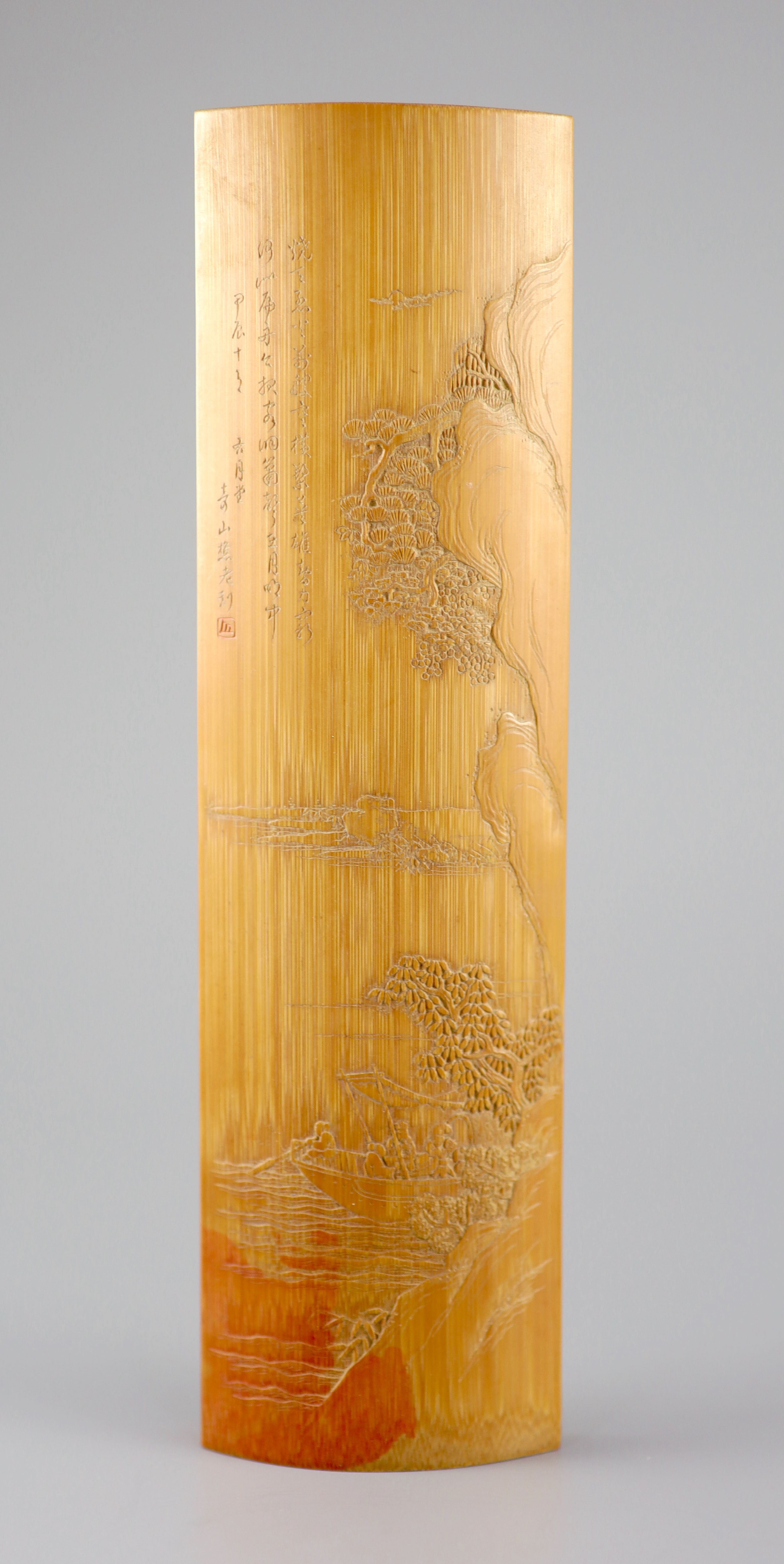 A Chinese carved bamboo wrist rest, Republic period, 22.7 cm long